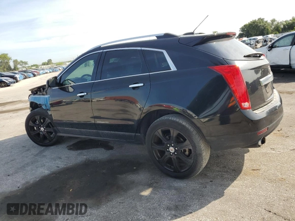 2015 Cadillac SRX Performance Collection with VIN 3GYFNCE32FS558430, listed as a Copart auction lot 63633865 with 153,729 mi miles and Salvage title. Bid and sale history available at DreamBid. Image 2.