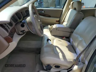 2005 Buick LeSabre Custom with VIN 1G4HP54K35U184059, listed as a Copart auction lot 50870355 with 154,673 mi miles and Salvage Title. Bid and sale history available at DreamBid. Image 7.