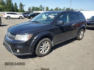 2013 Dodge Journey SXT with VIN 3C4PDDBG6DT639884, listed as a Copart auction lot 64623635 with 206,809 mi miles and Clean title. Bid and sale history available at DreamBid. Image 1.