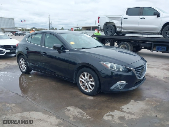 2016 Mazda Mazda3 i Grand Touring with VIN 3MZBM1N75GM267972, listed as a IAAI auction lot 41030060 with 86,065 mi miles. Bid and sale history available at carsss.com. Image 1.