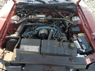 1996 Ford Mustang GT z VIN 1FALP42X0TF168223, wystawiony jako Copart lot #46351085 z przebiegiem 121 657 mil mil oraz Szkoda całkowita • Salvage title. Historia ofert i sprzedaży dostępna na DreamBid. Obrazek 11.