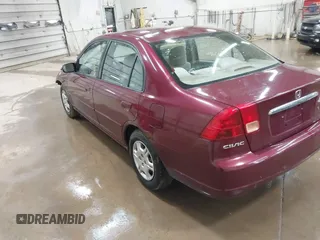 2002 Honda Civic LX with VIN 2HGES16512H513959, listed as a IAAI auction lot 42051292 with 137,656 mi miles and . Bid and sale history available at DreamBid. Image 3.