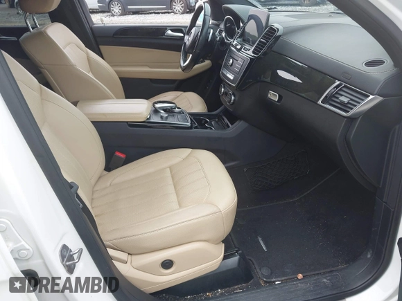 2018 Mercedes-Benz GLS 450 with VIN 4JGDF6EE2JB104367, listed as a IAAI auction lot 42351124 with 141,031 mi miles and . Bid and sale history available at DreamBid. Image 5.