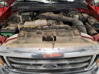2000 Ford F-250 XL z VIN 1FTNX21S5YEC10427, wystawiony jako Copart lot #59093625 z przebiegiem 111 585 mil mil oraz Szkoda całkowita • Salvage title. Historia ofert i sprzedaży dostępna na DreamBid. Obrazek 11.