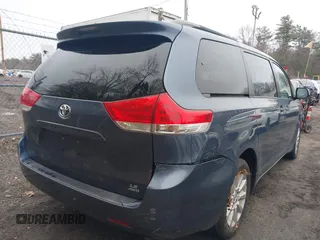 2013 Toyota Sienna LE with VIN 5TDJK3DC8DS064035, listed as a IAAI auction lot 41909785 with 135,716 mi miles and . Bid and sale history available at DreamBid. Image 4.