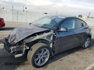 2024 Tesla Model Y Long Range with VIN 7SAYGDEE6RA261223, listed as a Copart auction lot 51926395 with 17,954 mi miles and Salvage title. Bid and sale history available at DreamBid. Image 1.