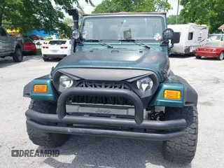 2000 Jeep Wrangler Sahara with VIN 1J4FA59S8YP722208, listed as a IAAI auction lot 42294978 with 238,024 mi miles and . Bid and sale history available at DreamBid. Image 12.