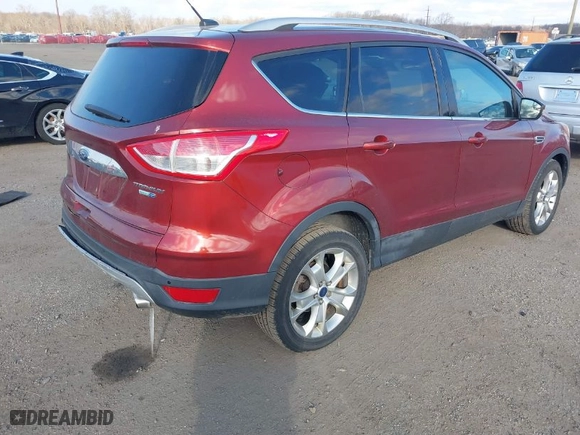 2014 Ford Escape Titanium with VIN 1FMCU9JX8EUB05561, listed as a IAAI auction lot 41602049 with 164,951 mi miles. Bid and sale history available at carsss.com. Image 4.