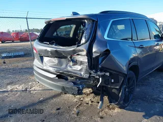 2022 Honda Pilot Special Edition with VIN 5FNYF5H26NB014269, listed as a IAAI auction lot 41239868 with 51,005 mi miles and . Bid and sale history available at carsss.com. Image 6.