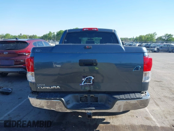 2010 Toyota Tundra with VIN 5TFEY5F11AX097360, listed as a IAAI auction lot 41990256 with 350,830 mi miles and . Bid and sale history available at DreamBid. Image 16.