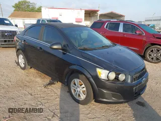 2014 Chevrolet Sonic LT with VIN 1G1JC5SB2E4223141, listed as a IAAI auction lot 41872526 with 154,026 mi miles and . Bid and sale history available at DreamBid. Image 1.