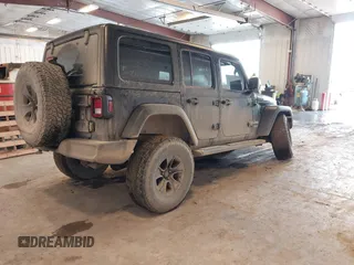 2020 Jeep Wrangler Unlimited Sport Altitude с VIN 1C4HJXDG4LW120627, выставлен на аукционе IAAI как лот 41728593 с пробегом 63 565 миль миль и . История ставок и продаж доступна на DreamBid. Изображение 4.