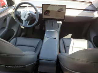 2024 Tesla Model Y Long Range with VIN 7SAYGAEE0RF016323, listed as a Copart auction lot 50253205 with 12,490 mi miles and Salvage title. Bid and sale history available at DreamBid. Image 8.