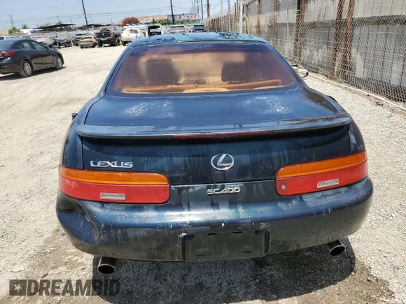 1994 Lexus SC 400 z VIN JT8UZ30C7R0037254, wystawiony jako Copart lot #57633215 z przebiegiem 196 214 mil mil oraz Szkody całkowita. Historia ofert i sprzedaży dostępna na DreamBid. Obrazek 6.