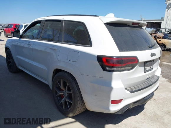 2017 Jeep Grand Cherokee SRT with VIN 1C4RJFDJ0HC699537, listed as a IAAI auction lot 41781500 with 105,640 mi miles. Bid and sale history available at carsss.com. Image 3.