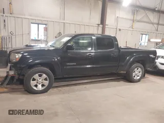 2009 Toyota Tacoma with VIN 3TMMU52N69M011591, listed as a IAAI auction lot 41941044 with 220,925 mi miles and . Bid and sale history available at DreamBid. Image 14.