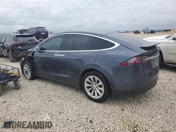 2017 Tesla Model X 90D with VIN 5YJXCBE26HF079246, listed as a Copart auction lot 50141605 with 68,905 mi miles and Salvage Title. Bid and sale history available at DreamBid. Image 2.