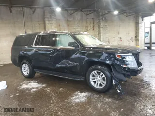 2018 Chevrolet Suburban LT with VIN 1GNSKHKC3JR211884, listed as a IAAI auction lot 41565824 with 81,899 mi miles. Bid and sale history available at carsss.com. Image 1.