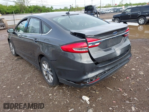 2017 Ford Fusion SE with VIN 3FA6P0H76HR411928, listed as a IAAI auction lot 42124817 with 88,184 mi miles and . Bid and sale history available at DreamBid. Image 3.