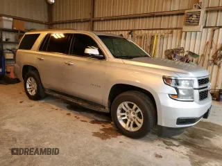 2015 Chevrolet Tahoe LS with VIN 1GNSCAKC0FR281838, listed as a Copart auction lot 51745675 with 151,483 mi miles and Clean title. Bid and sale history available at DreamBid. Image 4.