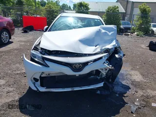2019 Toyota Camry LE with VIN 4T1B11HK2KU187475, listed as a IAAI auction lot 42192293 with 44,413 mi miles and . Bid and sale history available at DreamBid. Image 12.