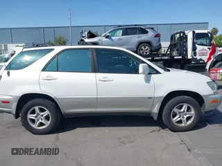 2003 Lexus RX 300 z VIN JTJGF10U330151793, wystawiony jako IAAI lot #42437285 z przebiegiem 252 619 mil mil oraz . Historia ofert i sprzedaży dostępna na DreamBid. Obrazek 13.
