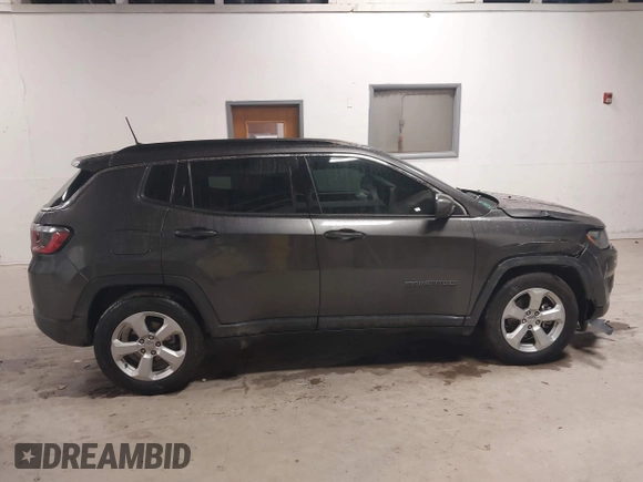 2020 Jeep Compass Latitude with VIN 3C4NJCBB8LT130425, listed as a IAAI auction lot 41475443 with 82,782 mi miles and . Bid and sale history available at carsss.com. Image 13.