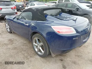 2009 Saturn Sky Red Line z VIN 1G8MT35X09Y105064, wystawiony jako IAAI lot #42197028 z przebiegiem 106 673 mil mil oraz . Historia ofert i sprzedaży dostępna na DreamBid. Obrazek 3.