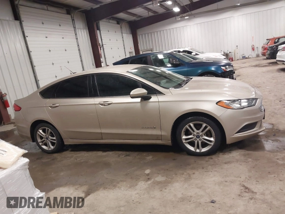 2018 Ford Fusion S z VIN 3FA6P0UU5JR100377, wystawiony jako IAAI lot #41300284 z przebiegiem 108 936 mil mil oraz . Historia ofert i sprzedaży dostępna na DreamBid. Obrazek 13.