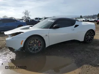 2014 Lotus Evora 2+2 z VIN SCCLMDTU5EHA10041, wystawiony jako Copart lot #45947345 z przebiegiem 26 179 mil mil oraz Szkody całkowita. Historia ofert i sprzedaży dostępna na DreamBid. Obrazek 1.
