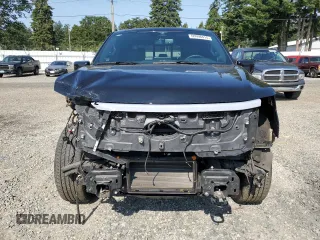 2023 Ford F-150 Lightning Pro with VIN 1FTVW1EV5PWG63666, listed as a Copart auction lot 60998415 with 35,089 mi miles and Salvage title. Bid and sale history available at DreamBid. Image 5.