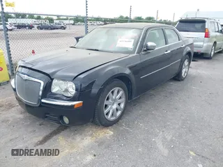 2007 Chrysler 300 C with VIN 2C3LA63H97H861511, listed as a IAAI auction lot 42136495 with 113,972 mi miles. Bid and sale history available at carsss.com. Image 2.