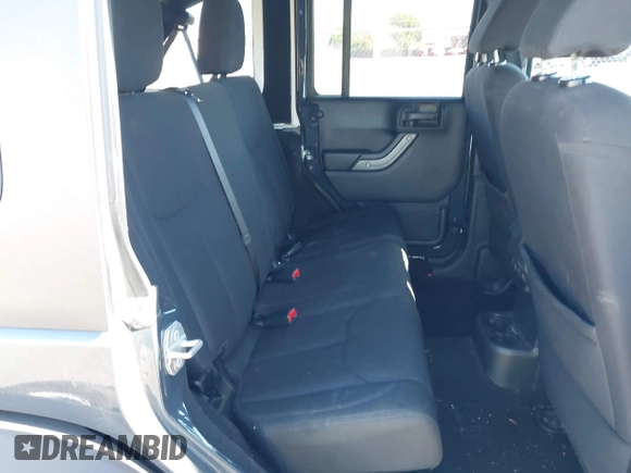 2018 Jeep Wrangler JK Unlimited Sport S with VIN 1C4BJWDG4JL868700, listed as a IAAI auction lot 41349566 with 68,539 mi miles. Bid and sale history available at carsss.com. Image 8.