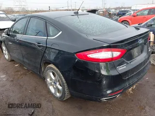 2016 Ford Fusion SE with VIN 3FA6P0T98GR367292, listed as a IAAI auction lot 41617850 with 165,518 mi miles and . Bid and sale history available at DreamBid. Image 3.