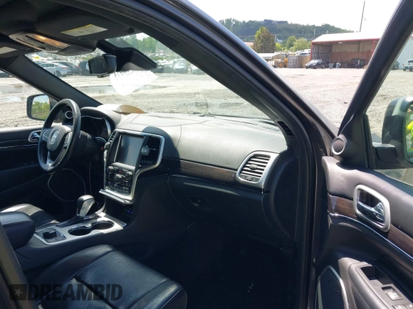 2016 Jeep Grand Cherokee Overland with VIN 1C4RJFCG6GC417485, listed as a IAAI auction lot 42210973 with 115,612 mi miles and . Bid and sale history available at DreamBid. Image 5.