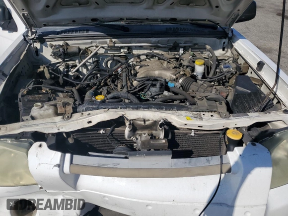 2004 Nissan Frontier XE with VIN 1N6ED29X94C423389, listed as a Copart auction lot 57357255 with 195,700 mi miles and Salvage title. Bid and sale history available at DreamBid. Image 11.