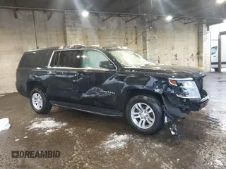 2018 Chevrolet Suburban LT with VIN 1GNSKHKC3JR211884, listed as a IAAI auction lot 41565824 with 81,899 mi miles. Bid and sale history available at carsss.com. Image 1.