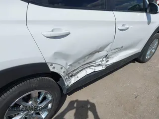 2019 Hyundai Tucson SE with VIN KM8J2CA43KU870933, listed as a IAAI auction lot 41972884 with 53,029 mi miles. Bid and sale history available at carsss.com. Image 6.