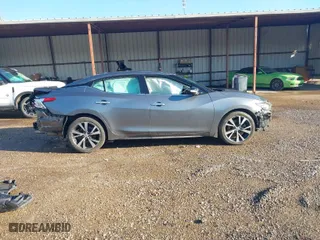 2016 Nissan Maxima 3.5 SV with VIN 1N4AA6APXGC386974, listed as a IAAI auction lot 41738932 with 132,395 mi miles. Bid and sale history available at carsss.com. Image 14.