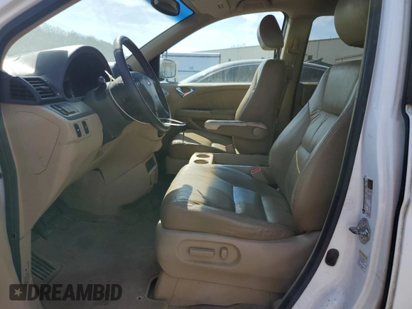 2010 Honda Odyssey EX-L with VIN 5FNRL3H77AB051869, listed as a Copart auction lot 48473815 with 248,511 mi miles and Salvage Title. Bid and sale history available at DreamBid. Image 7.