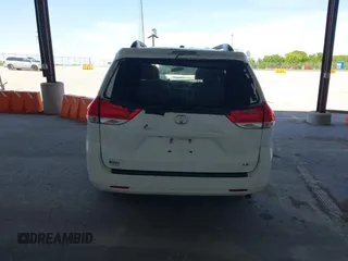 2014 Toyota Sienna LE AAS with VIN 5TDKK3DC2ES434546, listed as a IAAI auction lot 42227745 with 175,445 mi miles and . Bid and sale history available at DreamBid. Image 16.