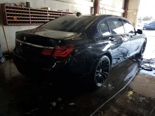 2014 BMW 7 Series ALPINA B7 xDrive with VIN WBAYF8C59ED141718, listed as a Copart auction lot 89348655 with 77,954 mi miles and Salvage Title. Bid and sale history available at DreamBid. Image 3.