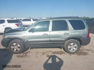 2004 Mazda Tribute ES with VIN 4F2CZ06184KM32333, listed as a IAAI auction lot 42041183 with 33,646 mi miles. Bid and sale history available at carsss.com. Image 14.