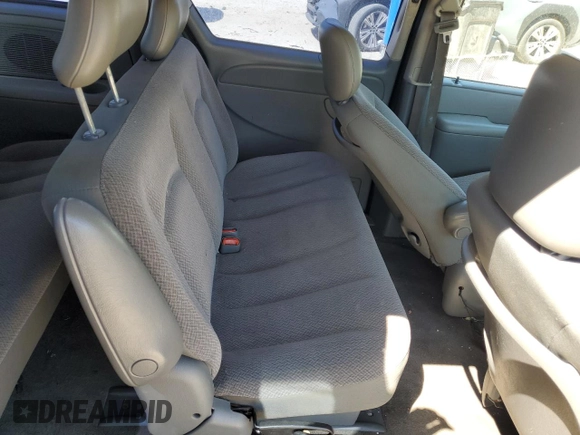 2007 Dodge Caravan SE z VIN 1D4GP25R87B116691, wystawiony jako Copart lot #51051585 z przebiegiem 128 919 mil mil oraz Czysty tytuł • Clean title. Historia ofert i sprzedaży dostępna na DreamBid. Obrazek 11.