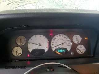 2002 Jeep Grand Cherokee Limited z VIN 1J8GW58S02C279251, wystawiony jako Copart lot #61563465 z przebiegiem 182 244 mil mil oraz Szkoda całkowita • Salvage title. Historia ofert i sprzedaży dostępna na DreamBid. Obrazek 9.