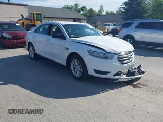 2014 Ford Taurus SE z VIN 1FAHP2D89EG128381, wystawiony jako IAAI lot #42379885 z przebiegiem 34 937 mil mil oraz . Historia ofert i sprzedaży dostępna na DreamBid. Obrazek 1.