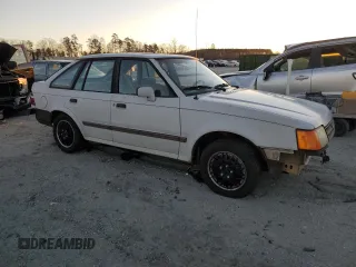 1988 Ford Escort z VIN 1FAPP959XJW370611, wystawiony jako Copart lot #86715994 z przebiegiem 3424 mil mil oraz Tytuł czysty. Historia ofert i sprzedaży dostępna na DreamBid. Obrazek 4.