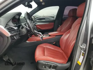 2018 BMW X6 sDrive35i with VIN 5UXKU0C52J0G81057, listed as a Copart auction lot 50698205 with 67,735 mi miles and Salvage Title. Bid and sale history available at carsss.com. Image 7.