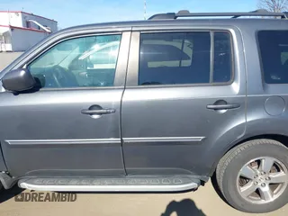 2011 Honda Pilot EX-L with VIN 5FNYF4H69BB015375, listed as a IAAI auction lot 41826235 with 199,171 mi miles and . Bid and sale history available at carsss.com. Image 14.