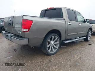 2007 Nissan Titan XE with VIN 1N6BA07A87N219609, listed as a IAAI auction lot 41451297 with 300,263 mi miles. Bid and sale history available at carsss.com. Image 4.